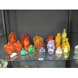A collection of Oriental carved and moulded semi precious stones, to include quartz (18)