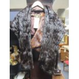 A fur shawl by Dickins and Jones of Regent Street and another