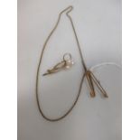 A 15ct rope chain and a 15ct tie pin (7.3g), a 9ct pearl brooch (3.9g) and an unmarked metal pin set