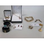 A quantity of 9ct to include a gate bracelet, gemset ring, earrings etc (14.g) together with a suite