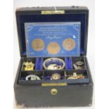 A leather jewellery box containing a lady's 9ct gold Vertex wristwatch, a small quantity of gilt