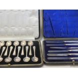 A group of silver to include twelve cased teaspoons, butter knives, three cigarette cases, small