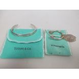 A Tiffany bangle and a key ring