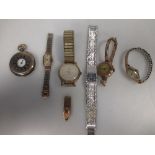 Three gold wristwatches, four others and a 9ct clip (8)