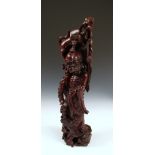 A wooden figure of Lidiehguei, 45cm (17.75 in) high good