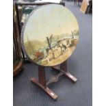 An oval tip top table with a painted scene of a quay, painted scene is 56 x 74 cm