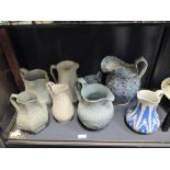 A quantity of Victorian jugs