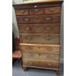 A George III mahogany chest on chest, the upper part with cavetto cornice, fitted three short and