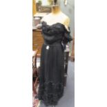 A collection of ladies clothes, to include a Victorian silk and lace black evening skirt and bodice,