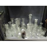 A quantity of 19th century and later glass decanters and drinking glasses (a few glass items have..