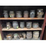 A collection of metal bound wooden spirit barrels