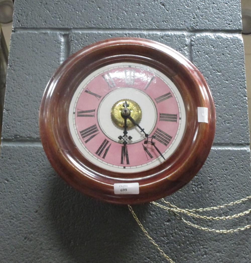 A 19th century postman's alarm wall clock