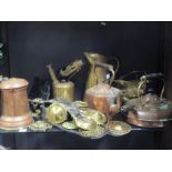 A collection of brassware to include horse brasses and heavy horse mounts