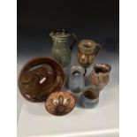 A small collection of studio ceramics, comprising a David Leach, Lowerdown Pottery jug, an Ara