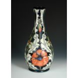 A large Moorcroft Poppy pattern vase designed by Rachel Bishop, of baluster form, impressed marks