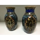 A pair of small Doulton Lambeth Slater patent vases, of baluster form with foliate decorated