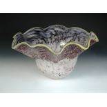 A large Murano style glass bowl, the mottled glass body with wavy flared rim 30 x 51cm (12 x 20in)