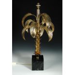 A metal standard lamp in the form of a palm tree, together with a similar table lamp, the later to a