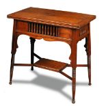 Liberty & Co., a Moorish card table, the fold-over rotating rectangular top above a frieze of turned