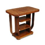 An Art Deco walnut occasional table, the rounded rectangular top on U-shaped support and two further