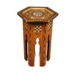 A Moorish hexagonal side table, with mother-of-pearl and ebony inlays on arched supports 46cm (18in)