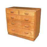 A 1930's pale oak chest of drawers, the two short and three long drawers having Art Deco style