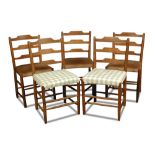 A set of five Cotswold School ash ladderback chairs, each with double stretcher to front and