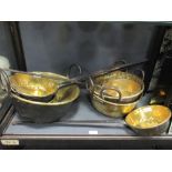 Three antique Spanish two handled brass cooking pans and four long handled pans of varying sizes (7)