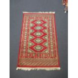 A finely woven Bokhara rug 153 x 96cm