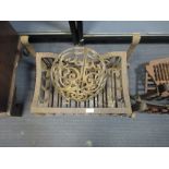 A wrought iron fire basket together with other fire wares