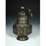A partially silvered bronze lidded tankard, possibly 12th/13th century Khorasan or Mosul, the