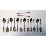 A set of twelve Victorian Scottish single struck Queens pattern teaspoons and matching tongs, by