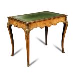 A Louis XV style walnut bureau plat, late 19th century, with gilt metal mounts, the leather lined