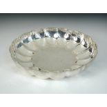 A large shallow circular silver fruit bowl, by Richard Comyns, London 1935, of plain lobed
