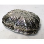 An 18th century French silver snuff box, maker FM, of serpentine form the body and cover cast with