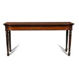 A Regency mahogany serving table in the manner of Gillow, with breakfront and panelled frieze, on
