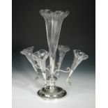 A Victorian electroplate and glass epergne, by William Hutton & Sons, Sheffield, raised from a