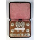 A set of Art Nouveau silver buttons and a belt buckle, by Levi and Salaman, Birmingham 1901, the