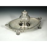 A large Victorian silver inkstand, by The Barnards, London 1870, the oval base engraved with greek