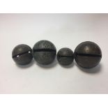 Four small 18th century bronze rumbler or croatal bells, one by Robert Wells of Aldbourne, one by