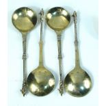 A set of four probably 17th century Dutch silver gilt spoons, marks unidentified, the fig shaped
