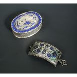 A late 19th century Indian silver box, of oval form, the body diaper engraved, the cover engraved