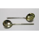 A Russian parcel gilt silver sauce ladle, maker's mark BM below eagle, assay master Aleksandr