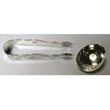 A George III silver jockey cap caddy spoon, maker IT, Birmingham 1798 with broad peak and bright cut