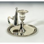 A George III silver chamberstick, by Richard Cooke, London 1802, standing on a circular base with