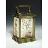 A French brass and porcelain panel repeating carriage clock, late 19th century, the dial and