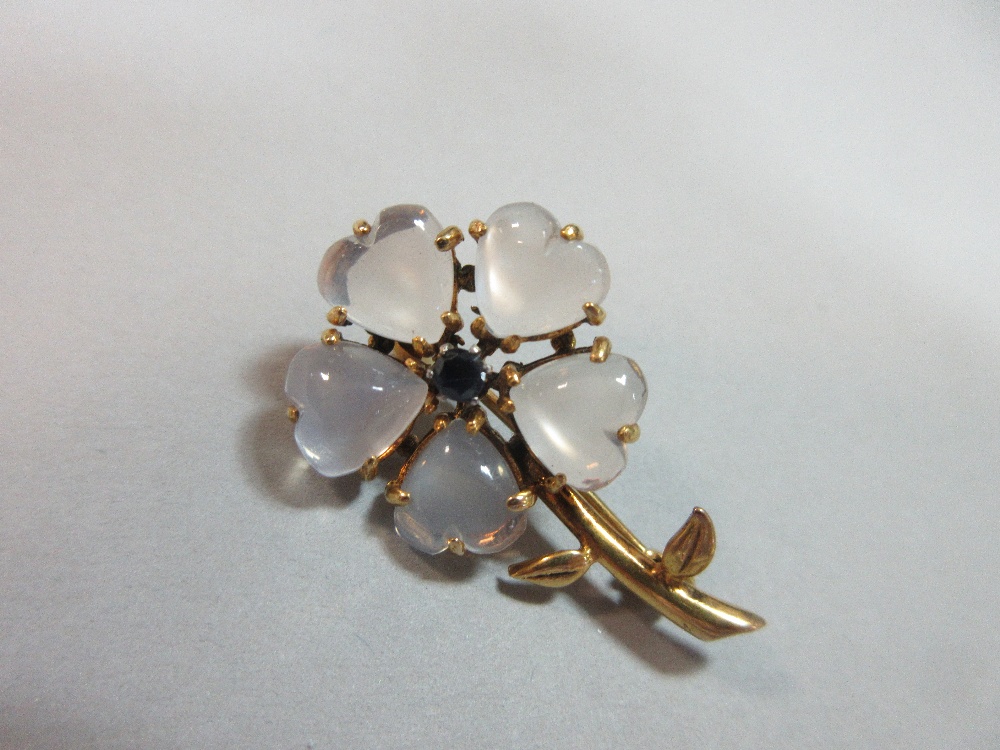 A moonstone and sapphire flower brooch, designed as a single flower with five heart-shaped