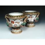 A rare pair of 19th century Mason's two handled wine coolers, of campana shaped form, decorated with