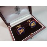 A pair of 18ct gold and enamel cufflinks by Asprey in their original fitted Asprey case, each