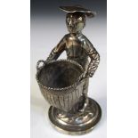 A late 19th century Chinese export silver figure, by Wang Hing, Canton, a man wearing a broad rimmed